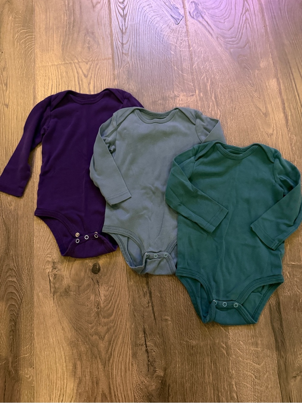 Primary Long-Sleeve Bodysuits in Purple, Blue, Teal Green
